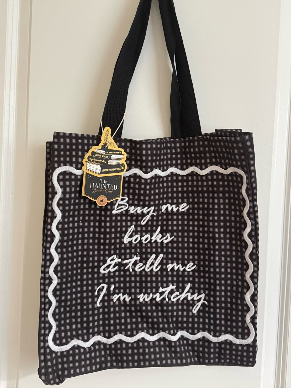 “Buy me books & tell me I’m witchy” tote bag - black & white checkered